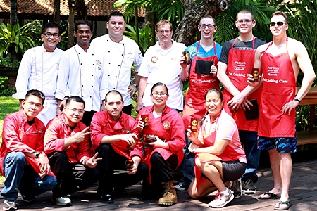 Participants and judges in the Cobra Gold 2012 Chili Cook-off pose for a commemorative photo.